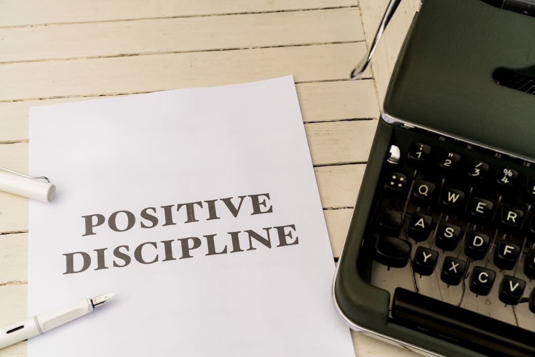 therapy dogs Alzheimer's — a piece of paper that says positive discipline next to a typewriter